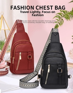 Close-up of litchi pattern PU leather chest bags in red and black with golden zippers