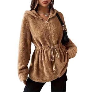 Detail of brown fleece hooded jacket featuring adjustable waist drawstring and metal zipper