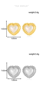 Flat lay view of gold and silver heart earrings with dimensions and 5.4g weight data