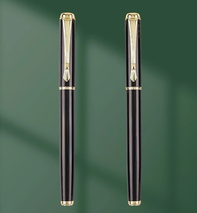 Detail of Morandi black and gold fountain pen with curved calligraphy nib for art drawing
