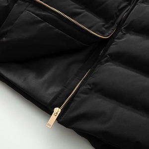 Slim fit black padded jacket for women featuring golden zipper and quilted texture