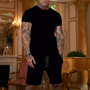 Men's summer streetwear set with black short sleeve t-shirt and matching shorts on model