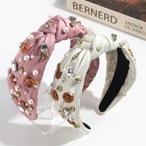 Knotted fabric headbands with pearls, rhinestones and basketball charms in pink and white