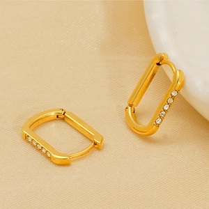Gold rectangular U-shaped hoop earrings featuring sparkling white zircon stones