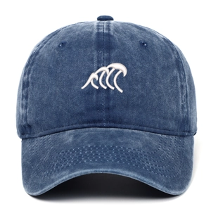 Vintage washed denim baseball cap with white wave embroidery and curved brim