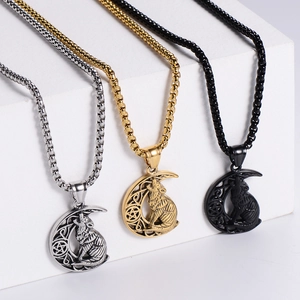 Viking wolf moon pendant necklace in silver, gold and black finishes on geometric stands
