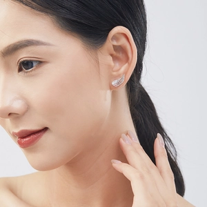 Elegant S925 sterling silver angel wing ear cuff with sparkling zircon on model