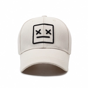 Classic beige cotton baseball cap featuring minimalist black square face embroidery