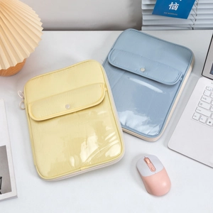 Detailed view of padded tablet sleeve with PVC pocket and snap button closure
