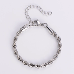Close-up of silver titanium steel rope chain bracelet with lobster clasp and extender