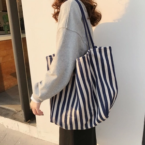 Minimalist large capacity tote bag with classic navy blue and white vertical stripes