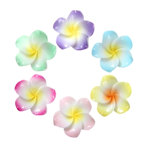 Colorful gradient resin frangipani flowers in circular layout for DIY hair clip accessories