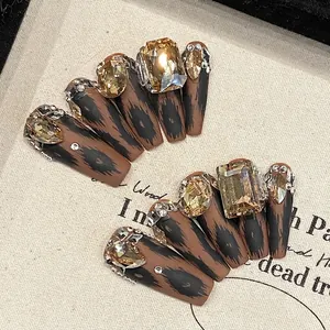 Handmade leopard print coffin nails with luxury champagne rhinestones for autumn winter