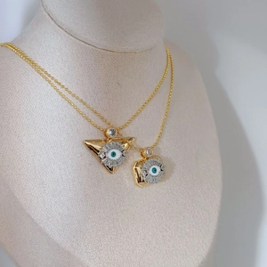 Vintage evil eye necklace with gold bead chain and geometric triangle blue enamel pendant