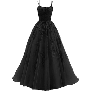 Close-up of black prom dress featuring delicate lace appliques and layered tulle texture