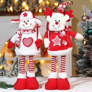 Detail of plush Christmas gnome ornaments with telescopic legs in a cozy festive setting