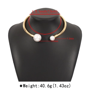 Detail view of gold snake-textured choker with pearls and 5.1-inch diameter dimension