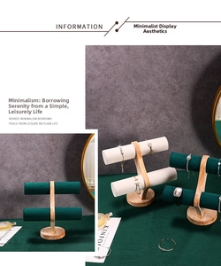 Double-tier wooden jewelry display stand with green and beige velvet T-bars for bracelets