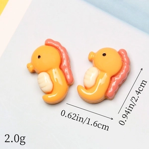Detail view of resin seahorse charms with 2.4cm height dimensions for DIY jewelry