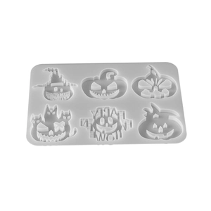 6-cavity Halloween pumpkin silicone mold featuring wizard hats and spooky cat designs