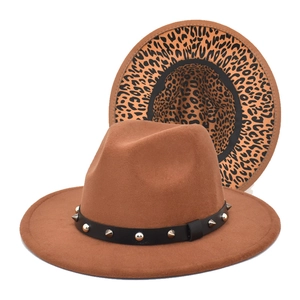 Classic tan wool fedora hat with black rivet band and leopard print brim underside