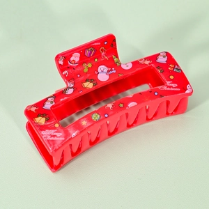 Red Christmas hair claw clip with festive Santa and Snowman prints for women