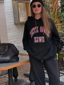 Oversized black hoodie with American varsity graphic print for autumn street style