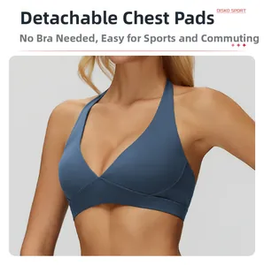 Macro detail of foggy blue sports bra with halter neck design and removable padding