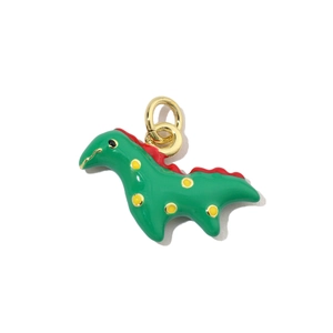 Detailed view of a green dinosaur pendant with red fins and gold plating for jewelry DIY