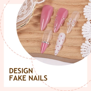Pink cat eye stiletto fake nails with butterfly charms and glitter rhinestones