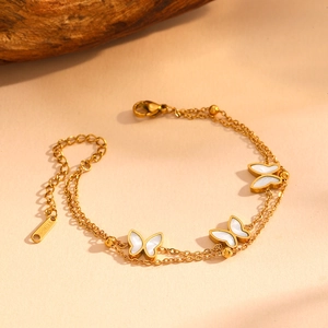 Double-layered golden stainless steel butterfly bracelet with white shell inlays and beads
