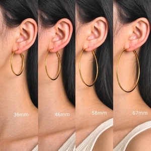 Comparison of 18k gold hoop earrings in 36mm, 46mm, 58mm, and 67mm diameter sizes