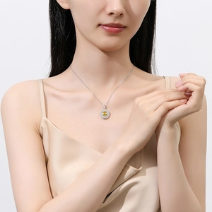 Elegant S925 sterling silver necklace with oval yellow gemstone halo pendant for women