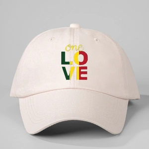 Pale pink baseball cap with one LOVE colorful print and adjustable strap for sun protection