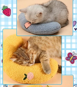 Detailed view of U-shaped soft fleece pet pillows with cute fruit embroidery for cats