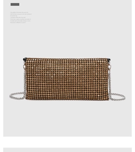 Detail of evening clutch featuring rhinestone mesh texture and detachable silver chain strap