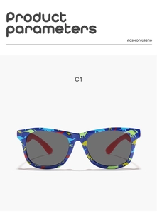 Detail view of square frame blue kids sunglasses with colorful dinosaur print patterns