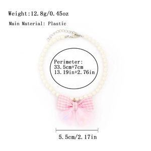 Detail view of pearl pet necklace with pink plaid bow and metal adjustment chain specs