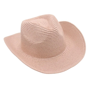 Close-up of pink woven panama beach hat showing fine straw texture and curled brim
