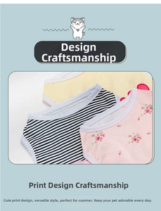 Detailed close-up of breathable cotton dog vests in yellow, stripes, and floral prints