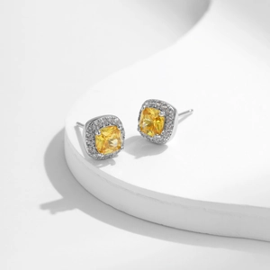 Elegant S925 sterling silver stud earrings featuring a yellow square gemstone with halo diamonds
