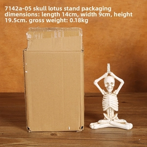 Detailed view of white resin meditating yoga skeleton statue with 14x9x19.5cm dimensions
