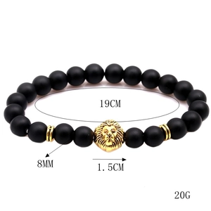 Detailed view of 8mm black matte beaded bracelet with 19cm length and golden lion head charm