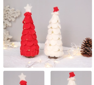 Detail of miniature wool felt Christmas trees with golden bells and wooden bases