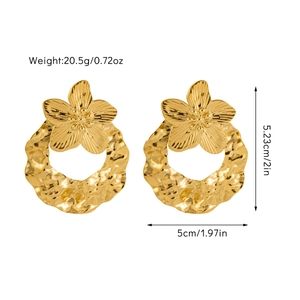 Detail of gold floral earrings with hammered texture rings showing weight and dimensions