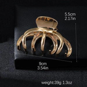 Golden metal hair claw clip for thick hair with dimensions 9cm and 39g weight specs