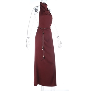 Detail of burgundy satin dress with halter neck and waist tassel beaded decoration