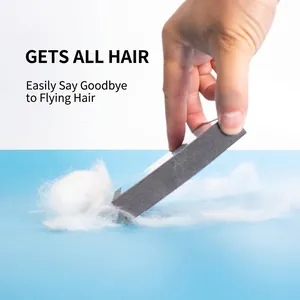 Grey pet hair removal sponge for cleaning sofa and carpet fabric surfaces