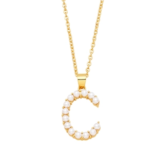 Minimalist gold necklace featuring a pearl-inlaid Letter C pendant on a white background