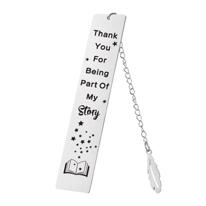 Macro shot of silver stainless steel bookmark with feather charm and thank you engraving